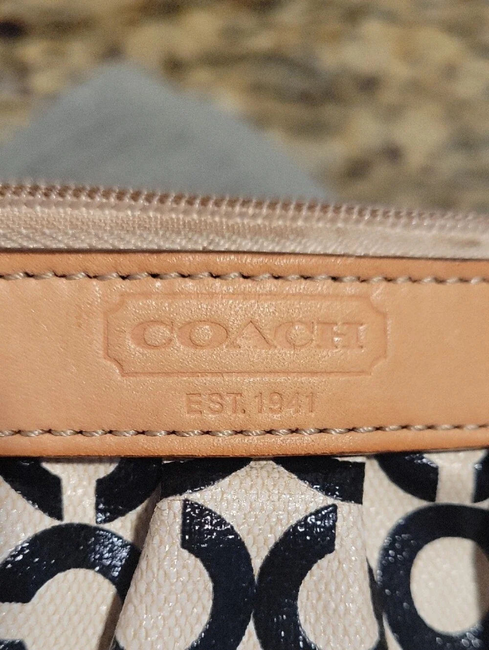 Coach Black and Cream Signature C Canvas Wristlet with Tan Leather Trim